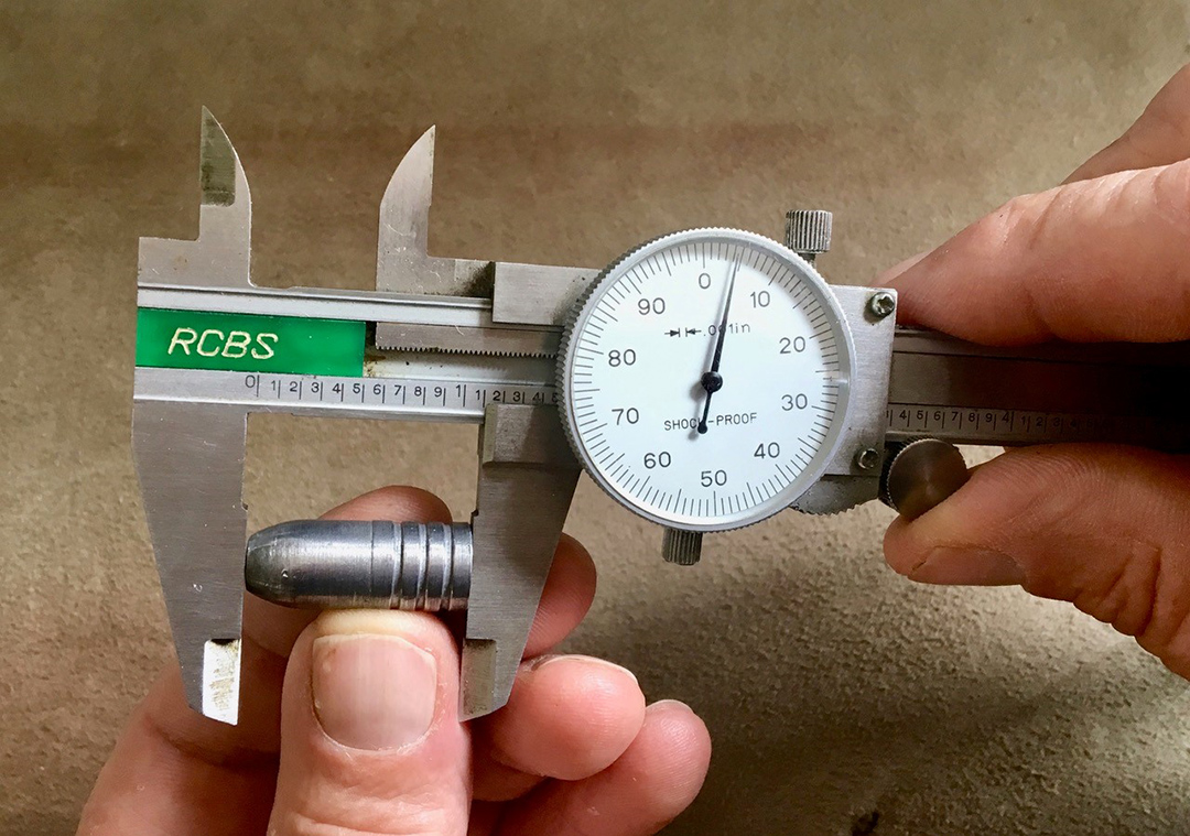 An RCBS Dial Caliber Measuring the length of a cast bullet.
